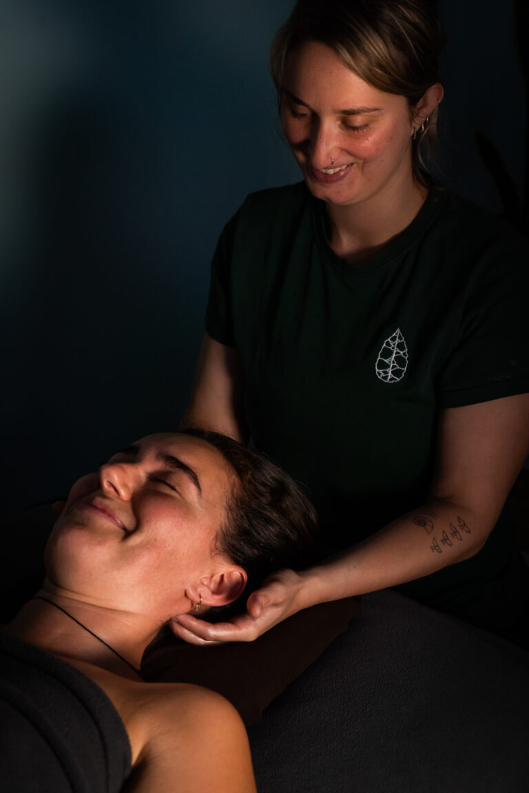 Picture of Sophie Wilson, massage therapist, giving massage to a female client